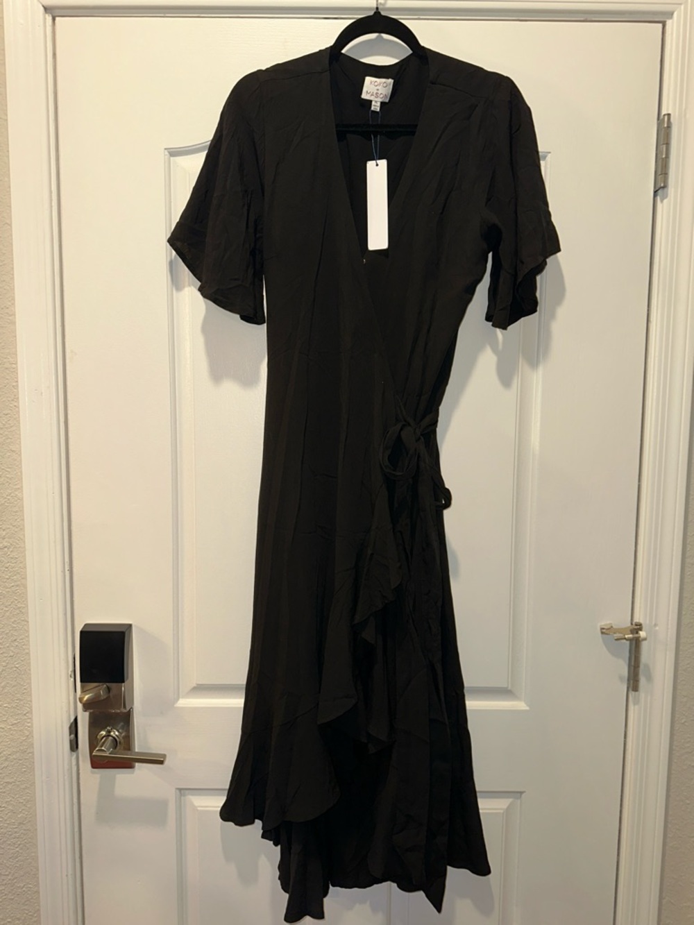 KOKO+MASON Black V-neck
Asymmetric Ruffle Hem
Butterfly Sleeve Wrap Dress
XL